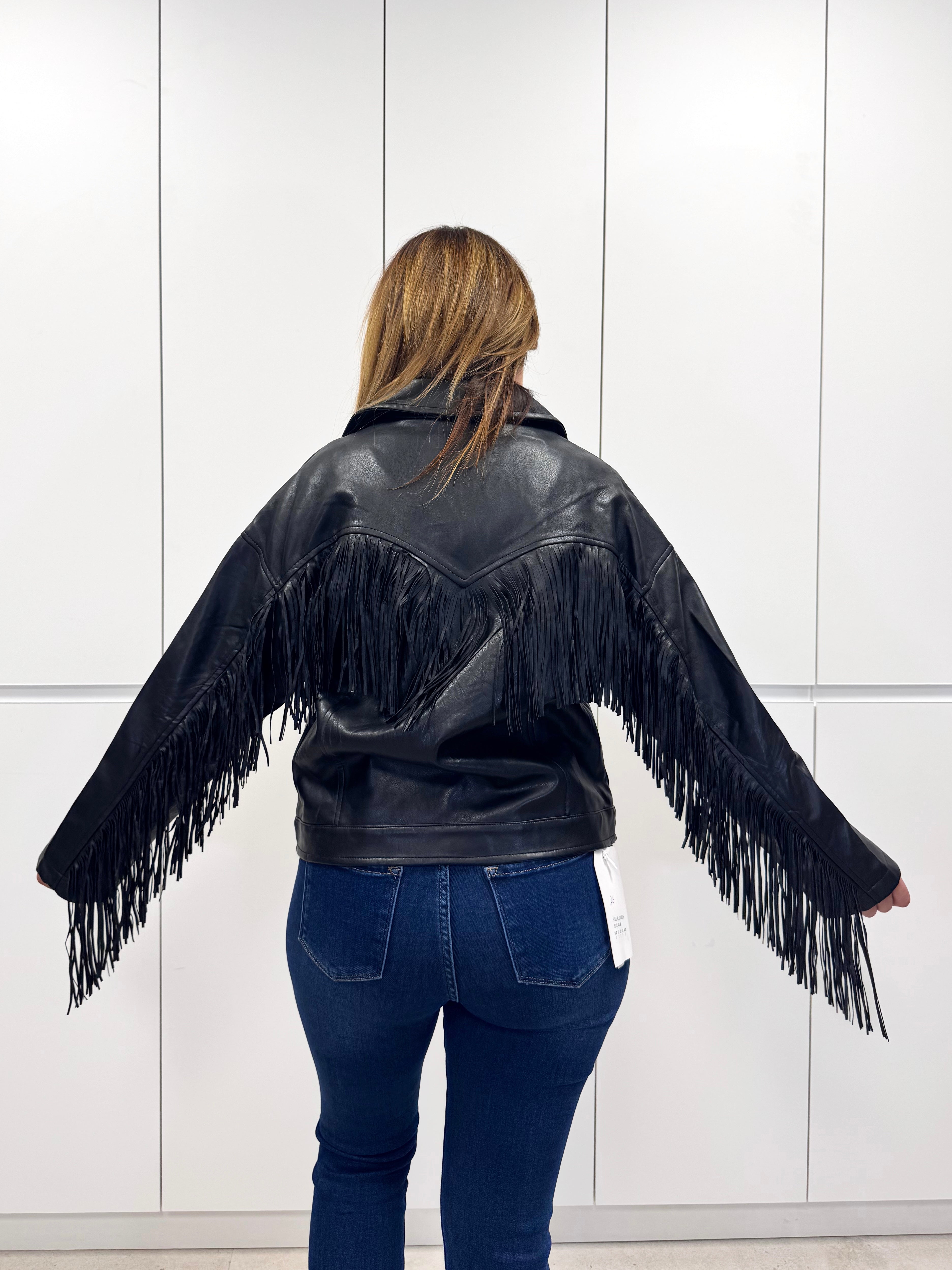 Chaqueta polipiel flecos