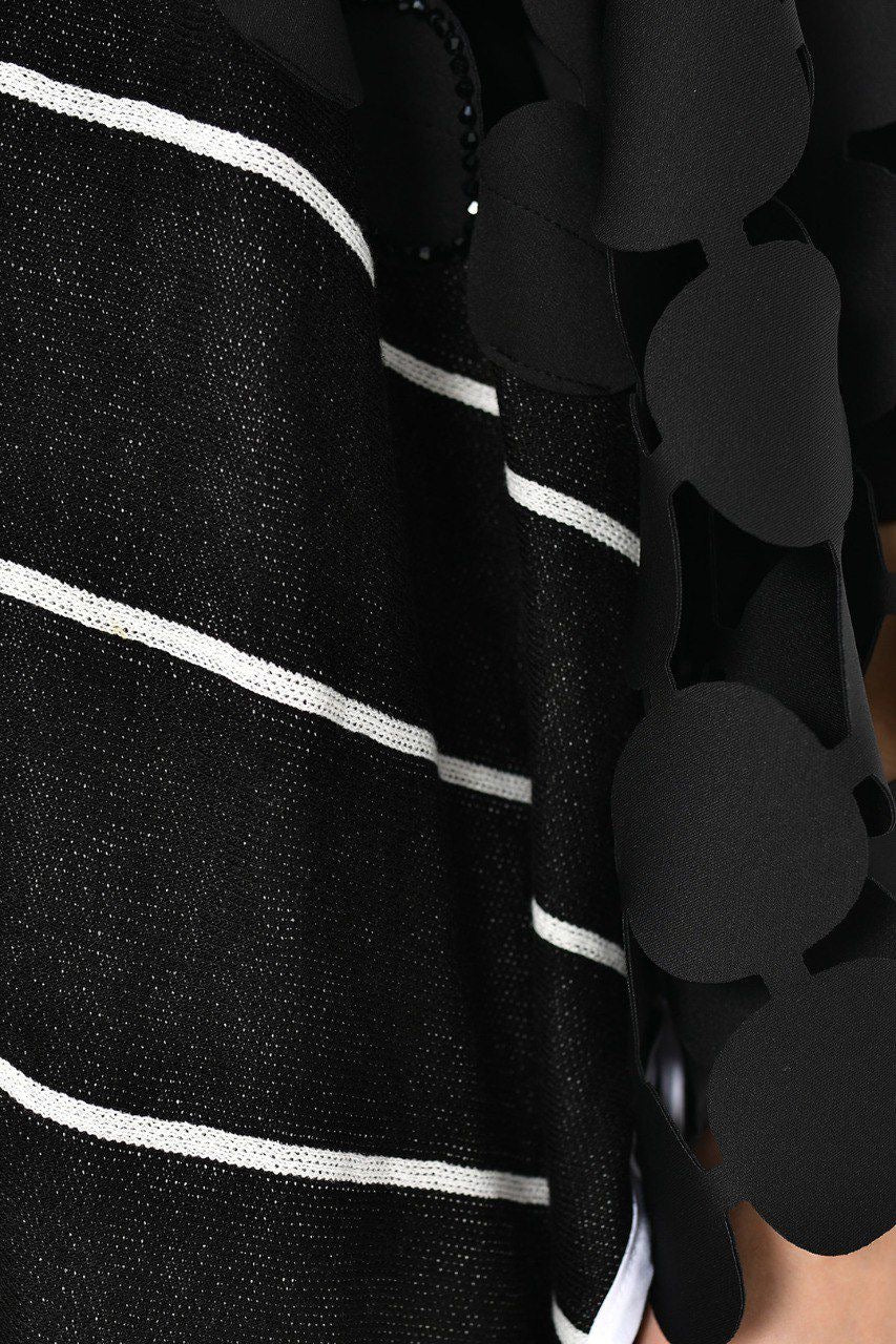 Chaqueta mangas esferas