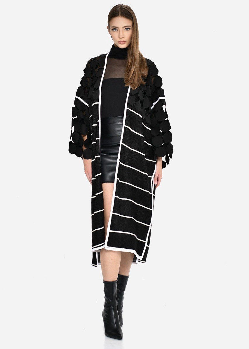 Chaqueta mangas esferas