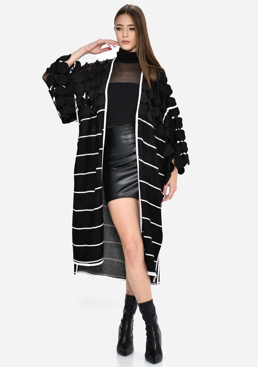 Chaqueta mangas esferas