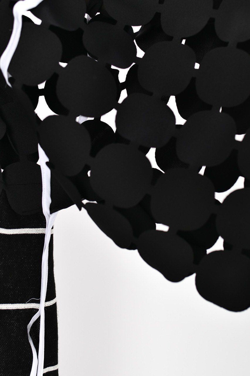 Chaqueta mangas esferas