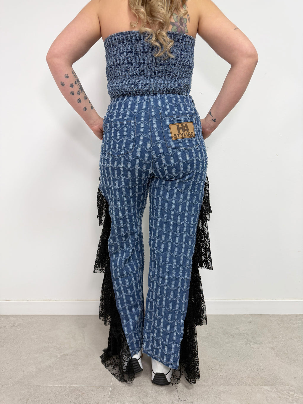 Top denim volante